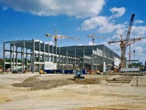 Surveying companies documenting a school campus expansion project in Fort Lauderdale, Florida.
